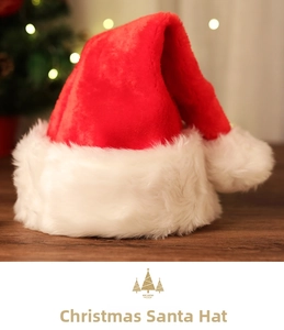 Detailed view of plush red Christmas hat with white faux fur trim and festive pom-pom