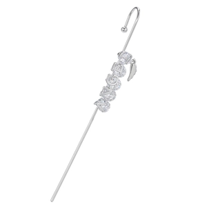 Detail of silver angel wing ear climber with zircons and letter lettering decoration