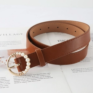 Brown leather belt for women featuring a gold round buckle with elegant pearl inlay
