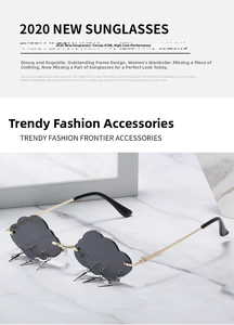 Close-up of cloud-shaped rimless sunglasses with dangling lightning metal charms