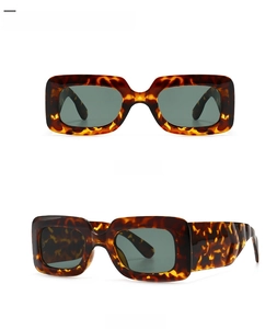 Front and 45-degree side views of retro leopard print sunglasses with green lenses