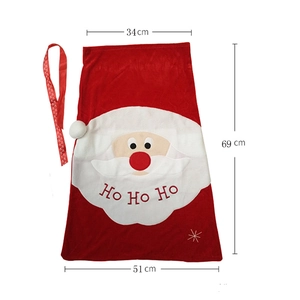 Detailed dimensions of the red velvet Santa gift bag with Ho Ho Ho print shown on white background