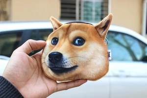 Detail of Shiba Inu plush coin purse featuring a sturdy metal zipper and keychain ring