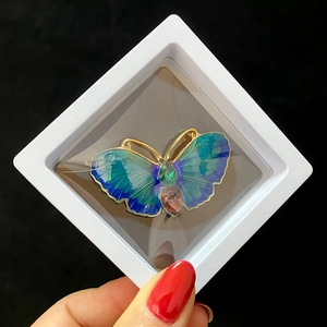 Elegant butterfly pearl brooch with blue gradient wings in a white gift display box