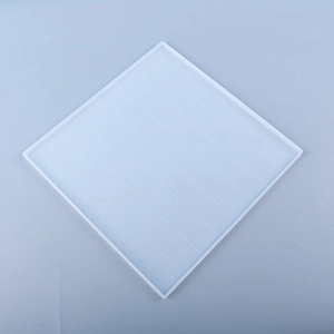 Macro detail of square grid silicone mold for DIY resin chess board making