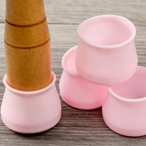 Pink silicone furniture leg protectors for anti-scratch and noise reduction on floors