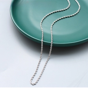 Detail of a 2mm stainless steel rope chain showing twisted metal texture and silver finish
