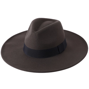 Detailed texture of thick dark brown wool felt fedora hat with black ribbon band