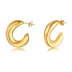 Macro detail of high-quality French retro 18k gold-plated C-shaped hollow hoop earrings