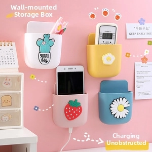 Wall-mounted organizer set in pink yellow white and blue with cute 3D decor motifs