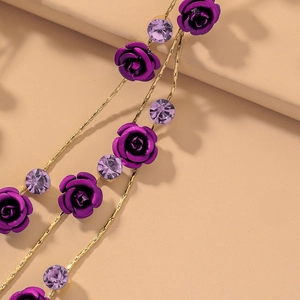 Boucles d'oreilles élégantes rose violette et pierre dorées avec de longues franges