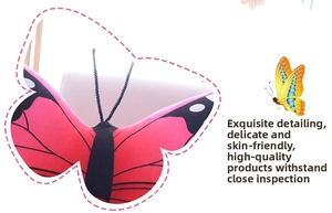 Detail of soft plush butterfly pillow with zipper and vibrant wing texture