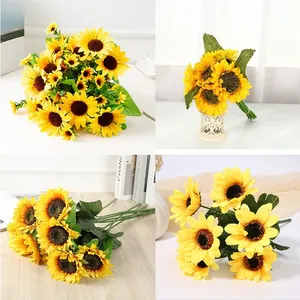 Close-up of artificial sunflower bouquet with vibrant yellow petals and green stems