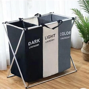 Three-section laundry hamper with X-frame and dark, light, color sorting partitions