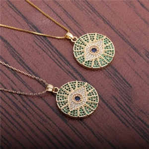 Golden necklace with circular evil eye pendant inlaid with colorful zircon stones