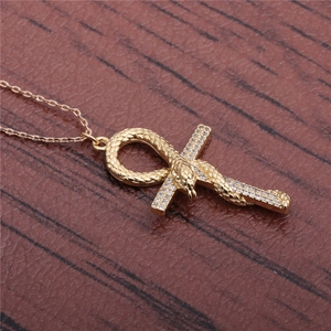 Golden Ankh cross necklace with snake wrap design and sparkling clear crystals