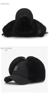 Detail of fleece lining and folded ear flaps on a men's winter bomber trapper hat