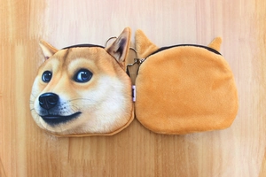 Detail view of Shiba Inu Doge plush coin purse with zipper closure and metal keychain