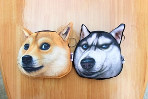 Detailed view of plush Shiba Inu and Husky coin purses with zippers and keychains
