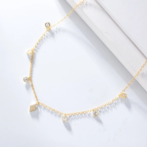 Detail of s925 silver choker necklace with seven round zircons and a diamond-paved rhombic pendant
