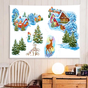 Cozy Christmas tapestry detail with snowman and reindeer on white wood wall