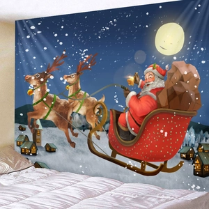 Detail of Christmas wall tapestry showing Santa Claus on a sleigh over snowy houses