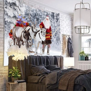 Macro detail of Christmas tapestry featuring Santa Claus and reindeer on a bedroom wall