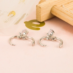 S925 silver earrings featuring a single round zircon with a secure clicker clasp closure