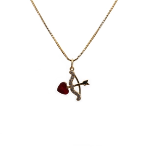 Gold cupid arrow necklace with red heart pendant and cubic zirconia inlays