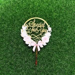 Golden acrylic round cake topper with pink flower wreath and Special For You lettering