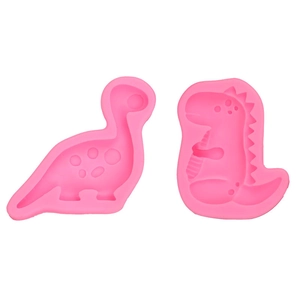 Pink silicone dinosaur fondant molds featuring long-neck and T-rex shapes for DIY baking