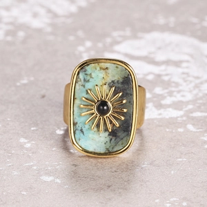 Vintage bohemian open ring featuring sunburst pattern with blue natural stone inlay