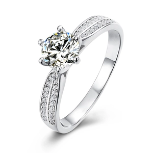 Sparkling S925 silver ring featuring 1 carat round moissanite with small side stones