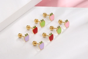 Close-up of apple earrings in four colors with flat screw back studs for piercings