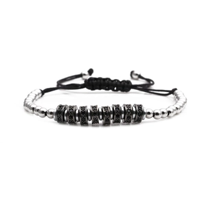 Adjustable woven bracelet with silver beads and black zircon micro-pave discs on cord