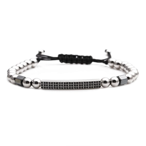 Adjustable woven bracelet with silver beads and rectangular black zircon bar charm