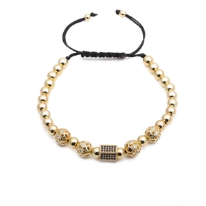 Adjustable woven bracelet with gold beads and micro-set zircon hexagonal charms
