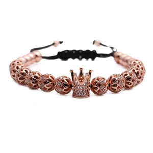 Adjustable rose gold crown bracelet with micro-pave zircon beads on white background