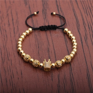 Adjustable crown charm bracelet with micro-pave zircons and woven black rope detail