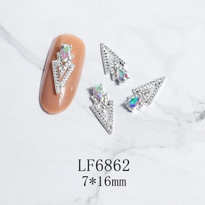 Detailed 3D nail art charms with hollow triangle design and rainbow AB teardrop crystal