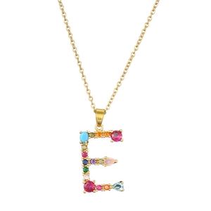 Detail of gold letter E necklace pendant set with colorful round and teardrop gemstones