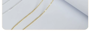 Close-up of gold and silver plated metal DIY necklace chains with a polished finish
