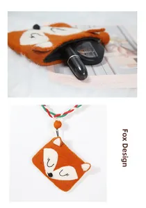 Detail of handmade fox wool felt coin purse showing interior storage and braided strap