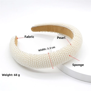 Detail of baroque pearl headband showing 3.3cm width and soft padded sponge texture