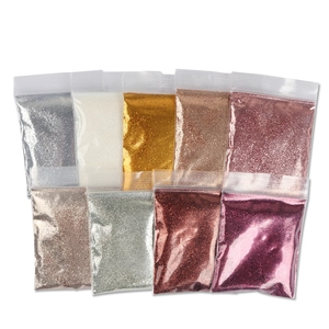 Champagne gold nail art glitter powder set with various metallic colors in small packets