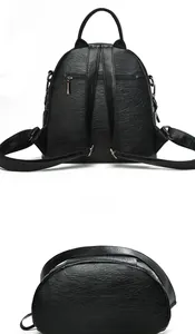 Detail view showing the textured black leather back zipper pocket and wide bottom base