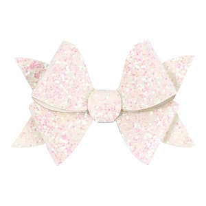 Detailed view of a white glitter bow hair clip with sparkling texture and sequin fabric
