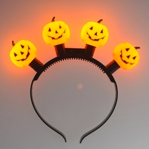Halloween headband with four glowing LED orange pumpkin ornaments on a black frame