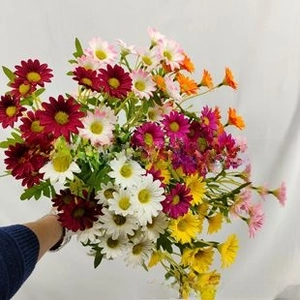 Detailed close-up of multi-color silk daisy bouquets for wedding and home decoration