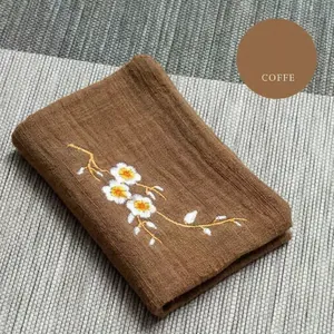 Thick light brown cotton linen tea towel with white floral embroidery for tea ceremonies